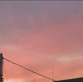 Portrait of a man in his 40s smiling professionally.